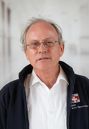 Martin_Stephan Portrait photo of a middle-aged man in a brightly lit interior